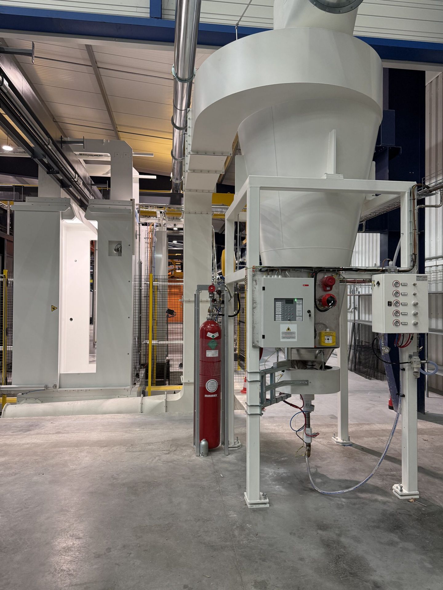 Intégration d'une cabine de poudrage WAGNER