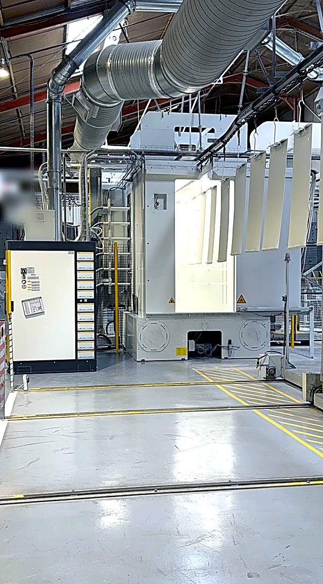 La ligne de poudrage automatique : cabine, groupe filtrant et armoire de commande